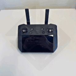 Télécommande noire avec écran et antennes.
