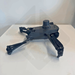 Drone noir sur une table blanche.