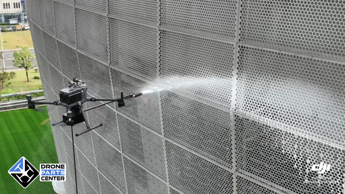Drone cleaning a metal façade.