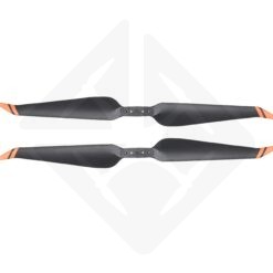Drone propellers with orange and black tips.