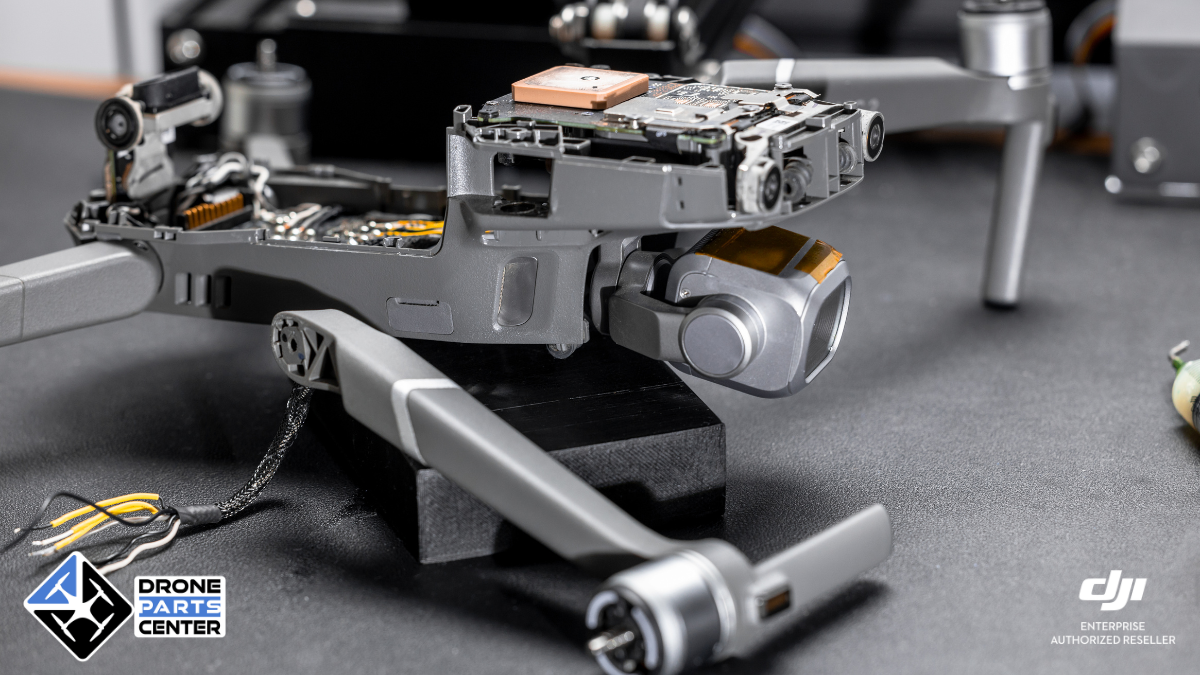 Drone being repaired on a table.