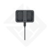 Black battery charger with two slots.