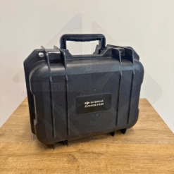 Boîtier noir DJI Zenmuse H20N sur table.