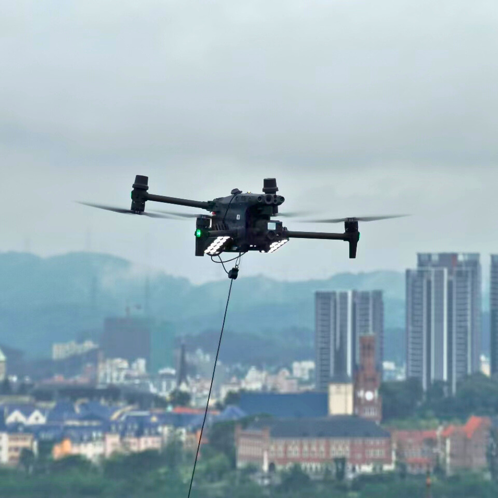 Drone flying over a city with skyscrapers.