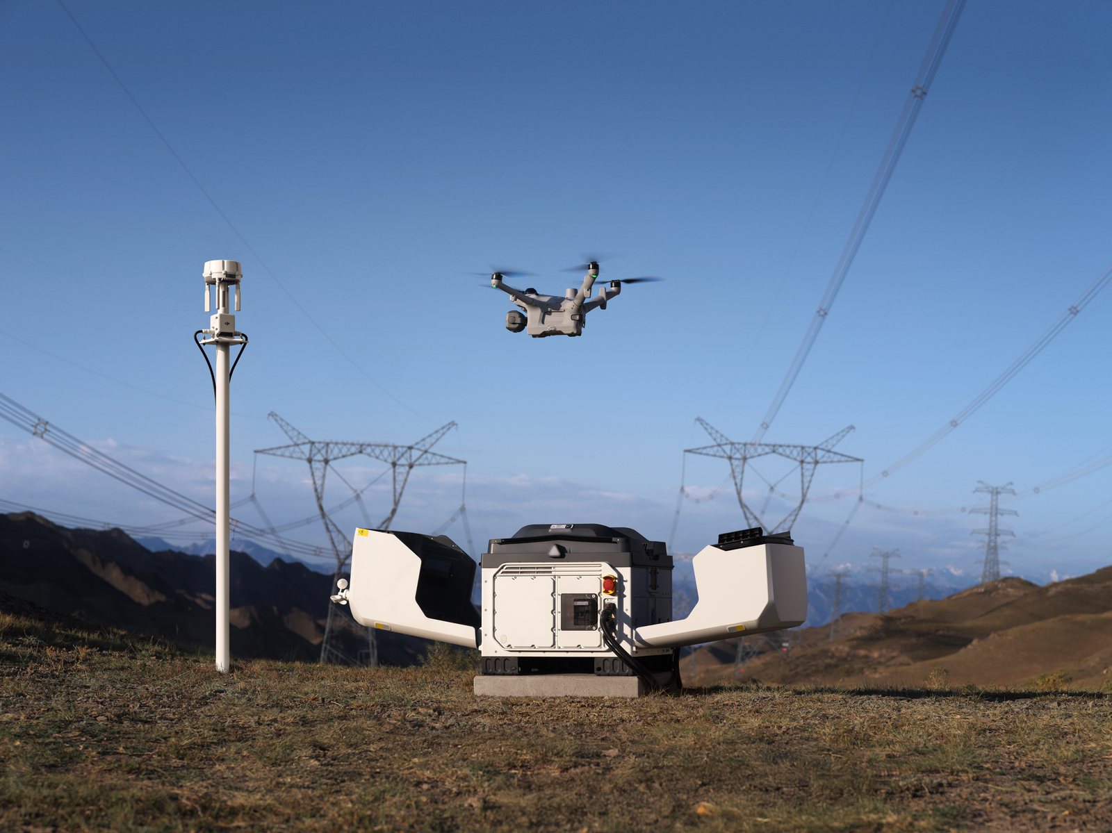 DJI Matrice 5TD taking off from the DJI Dock 4 near a power substation